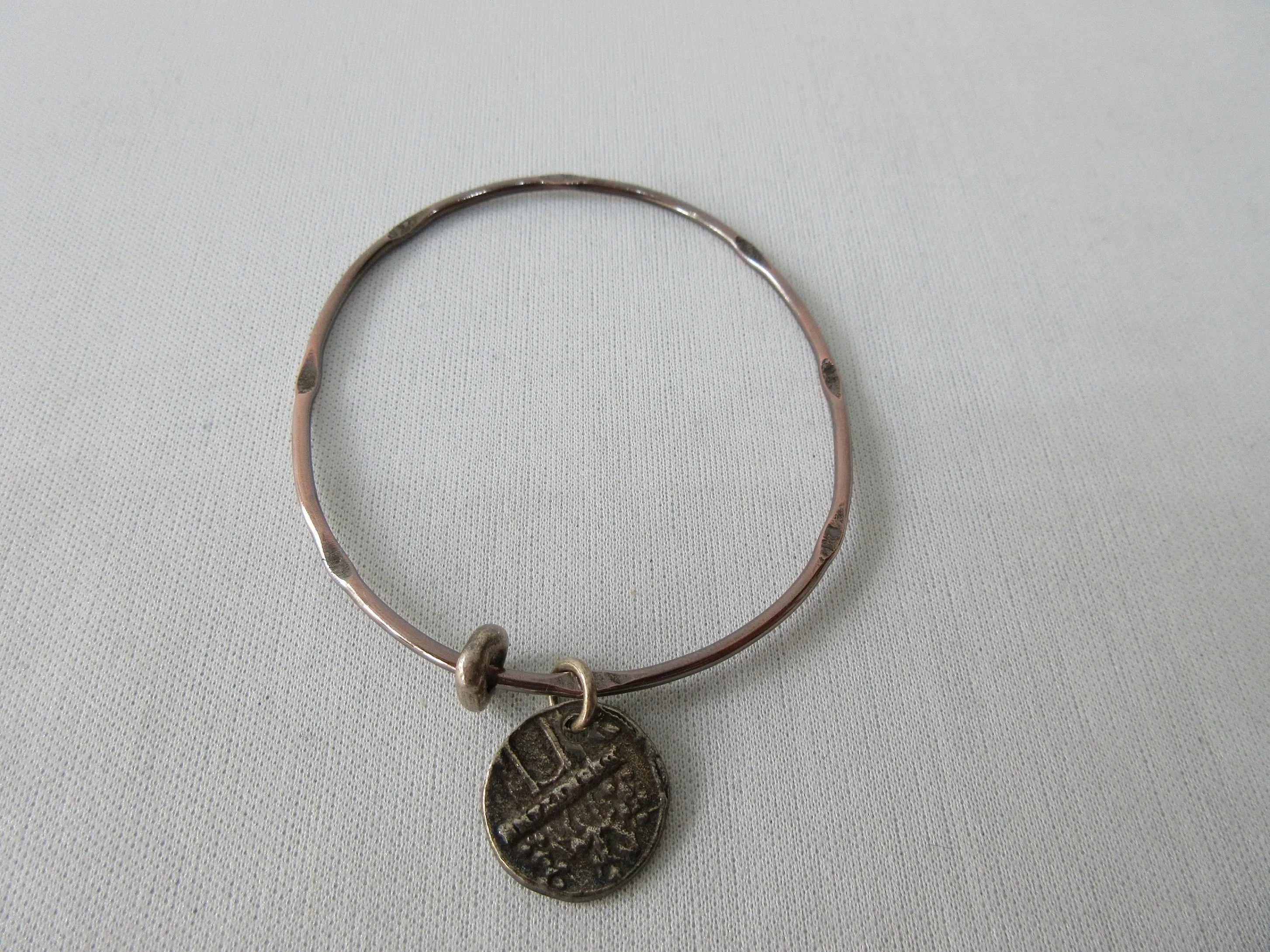 20A45 -Karyn Chopik Dented Silver Bracelet with Attached Coin Ring