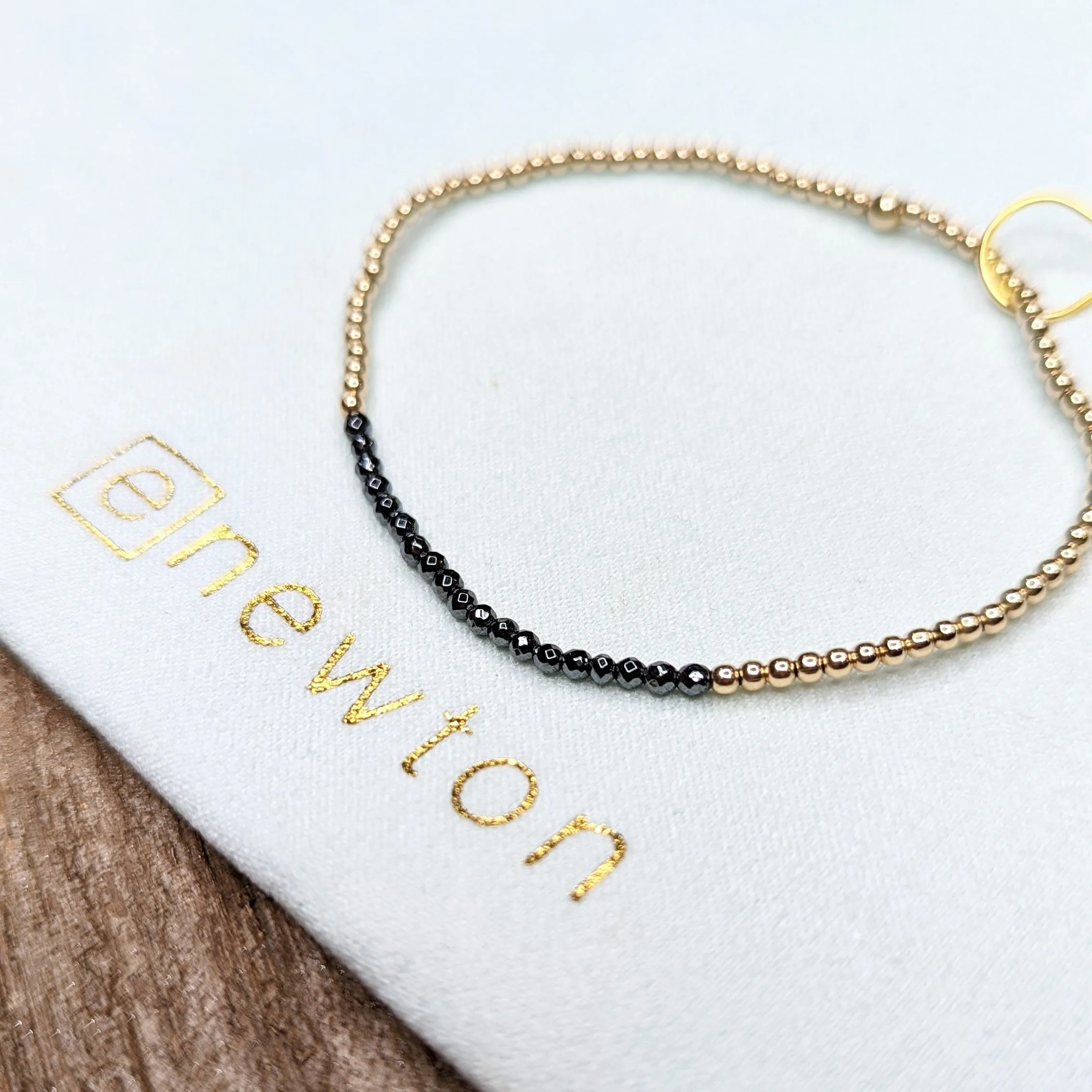 GOLD BLISS 2MM FACETED HEMATITE