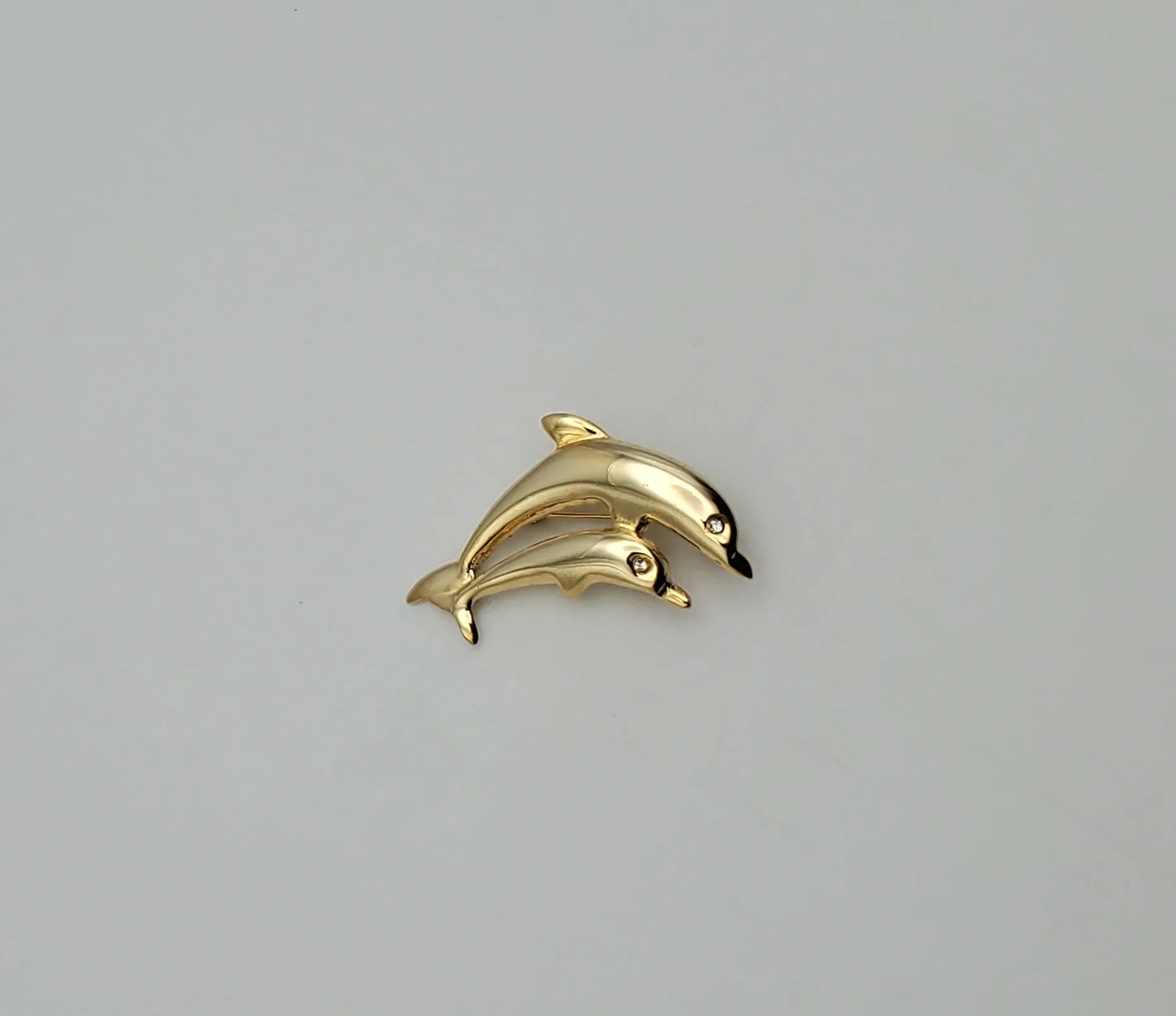 Gold Tone Dolphins Brooch