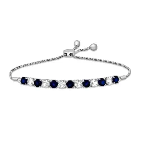 Jewelili Sterling Silver Round Created Blue Sapphire and Created White Sapphire Bolo Bracelet